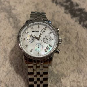 Woman’s stainless steel Michael kors watch